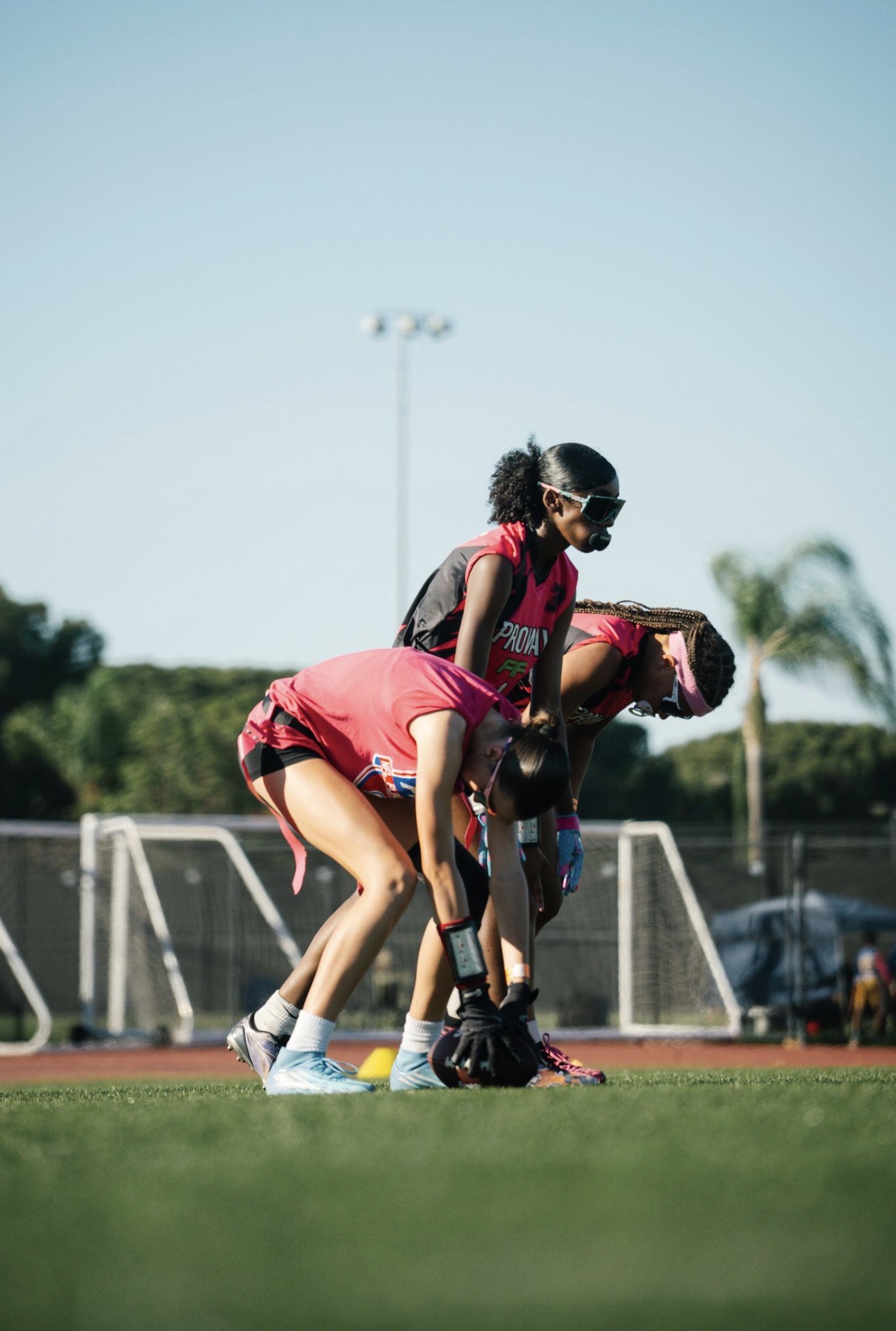 Proway player making a flag football play during a game